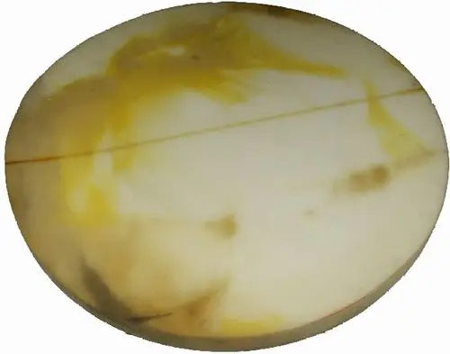 Deckel aus hellem, mattem Material mit gelblichen und grauen Einsprengseln, geeignet für Wärmedämmung, hergestellt von Wolf.